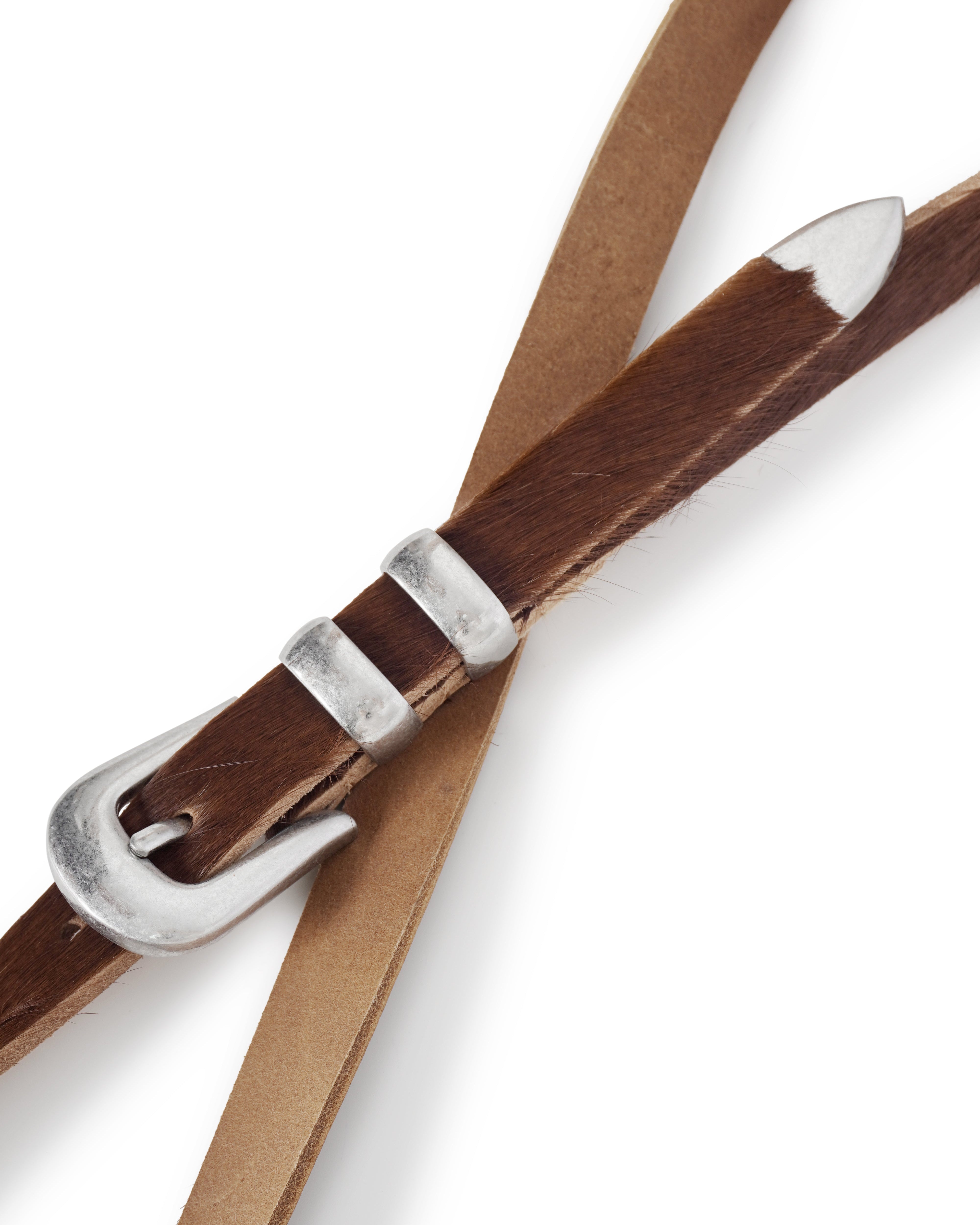Brown leather belt with silver buckle on a white background