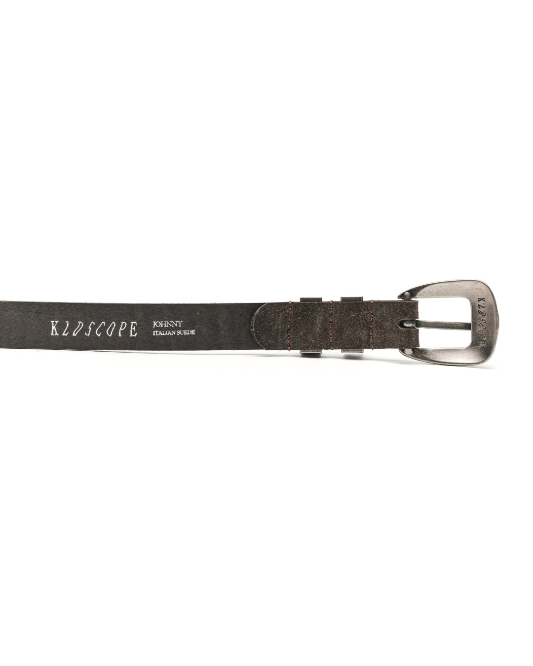A dark brown textured leather belt with a silver-toned metal buckle, shown horizontally against a plain white background. The belt strap features the brand name 'KLDSCOPE'.