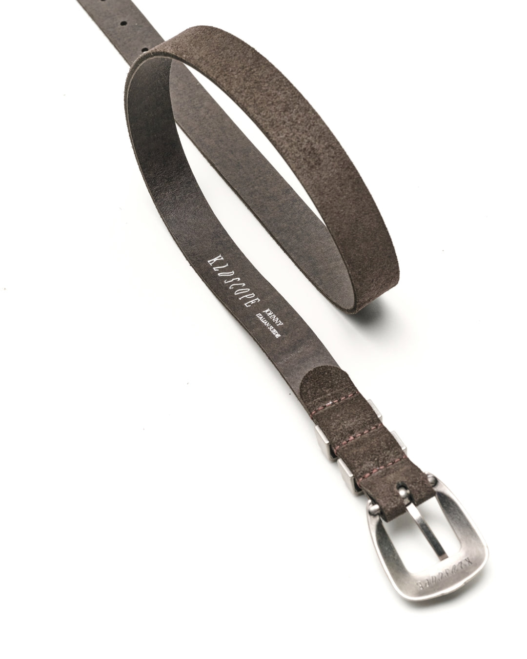 A dark brown textured leather belt with a silver metal buckle, shown on a clean white background. The brand name 'KLDSCOPE' is printed in white script on the strap.