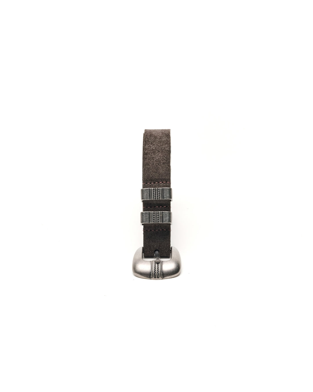 A close-up of a western belt with a dark brown textured fabric, silver-toned metal hardware, and a silver buckle, shown against a plain white background.