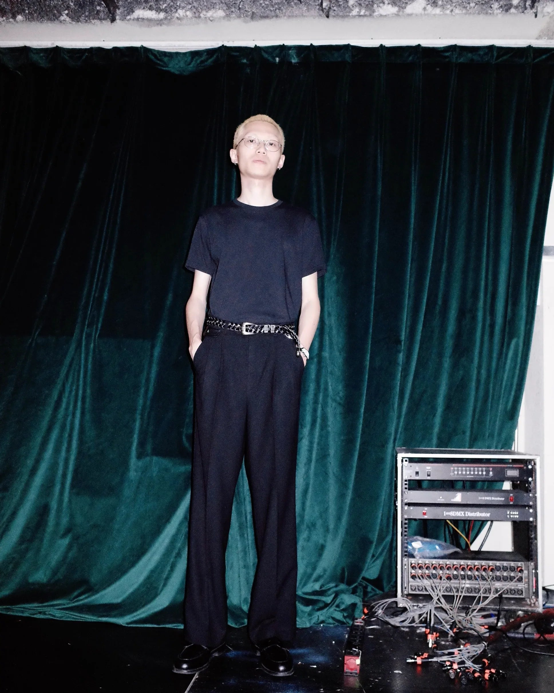 Deep black Western belt by KLDSCOPE with braided leather and Johnny belt buckle, worn by a man, an essential men’s fashion accessory, shop now.