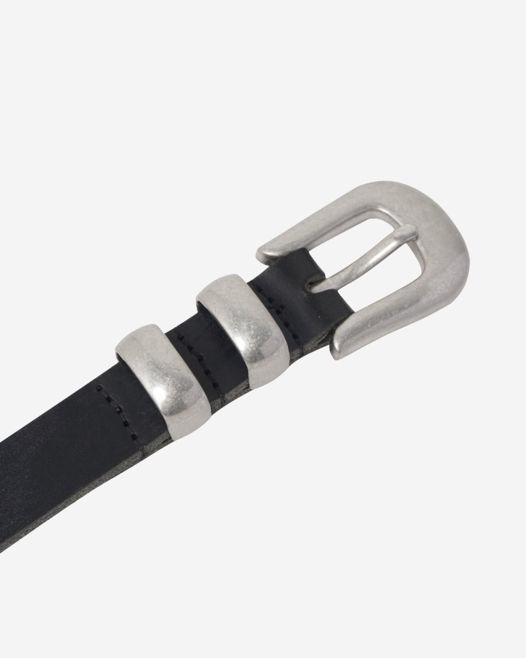 Image of a stylish black leather Western belt with buckles close up, placed on a white surface.
