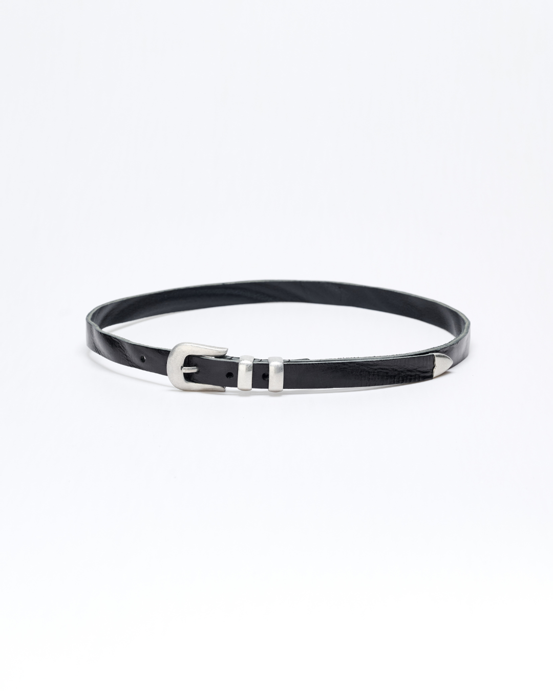 Black belt with a silver buckle on a white background