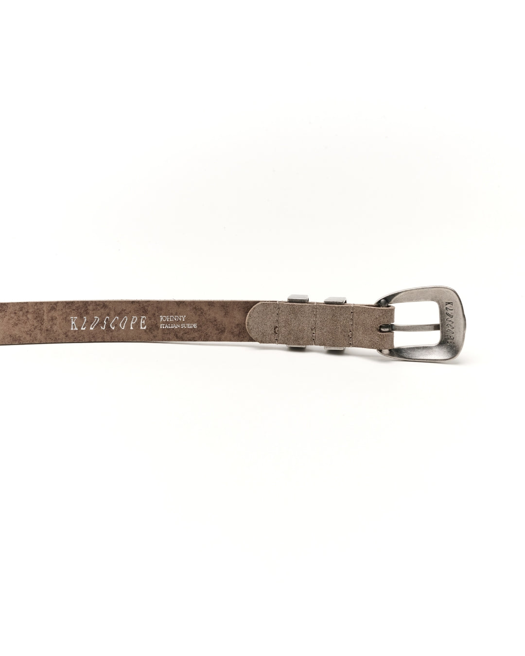 A sand-grey textured leather Western belt with a silver-tone metal buckle, shown on a plain white background. The inside of the strap features the brand name 'KLDSCOPE' printed in silver.