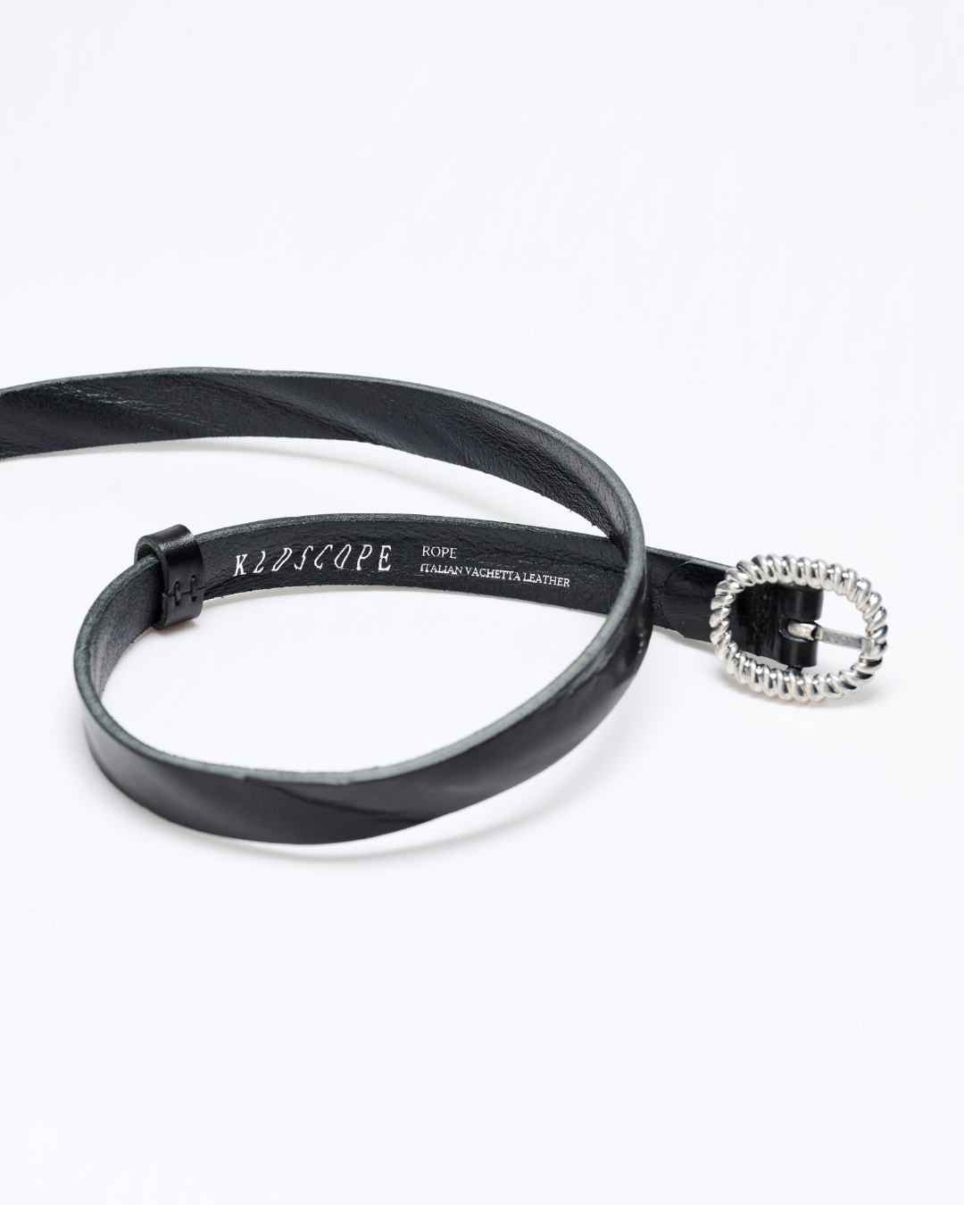 Black leather belt with silver buckle on a white background